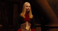 Behind this door a dark entityEvil ancient and hungryHELLBOY sighing Oh wellLet me go in and say hi