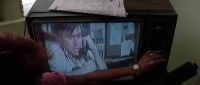 (CHATTERING ON TV)