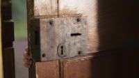 (door creaking)