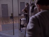 [inmates yelling]
