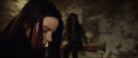 It doesn't matter if you open that door ClaireThere's a second locked doorHe's gonna come in here again any secondand we're not letting him take one of us out againWe just cried and screamed and we