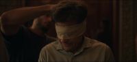 [men murmuring in Spanish]