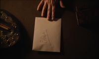[pen thuds]