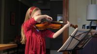( playing classical music )