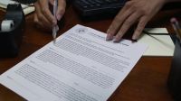 Sign here, here and here