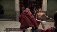 Spartacus wields practice swords