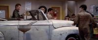 The problem's in this rubber band engineThe problem's in your mouthYeah and where you gonna get a new carburettor huhYou ever heard of borrowing Kenickie you got any Scotch tape