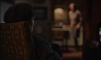 [TV chatter continues]