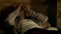 (TV hums)