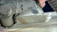 USING A PLANER, HE REFINES THIS STARTING SHAPE