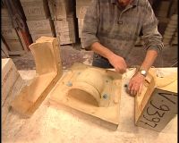 USING THIS MODEL, THEY CAST A MASTER MOLD
