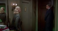 Well? It should be back from your face and pinned at the neck. I told her that. I told you that. We