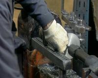 WHEN WORKING THE HAND LATHE