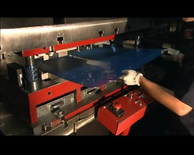 A 300-TON PRESS
THEN PERFORATES THE SHEET - How It's Made