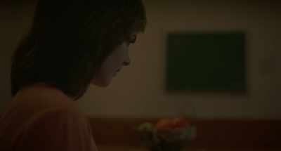 A... an adult woman. - A Friend of the Family