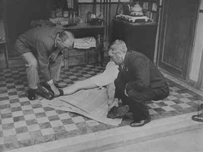 A Belgian demonstrates the manner - Nazi Concentration Camps