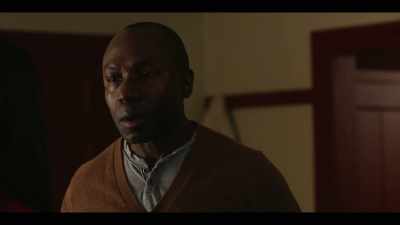 A black man, - October Faction