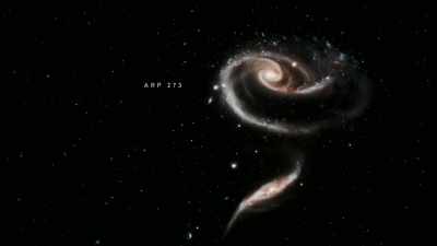 A cosmic rose,
galaxies colliding in a celestial dance, - Universe