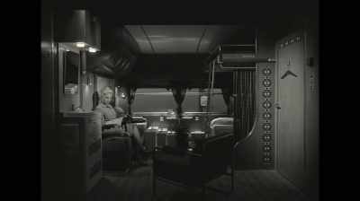 A drawing room on board
the Apache Plainsliner - Asteroid City