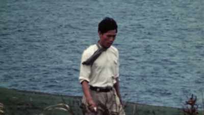 A FEW COME OUT
IN BUSINESS ATTIRE. - The Pacific War in Color