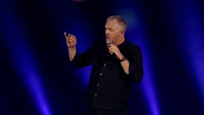 A giant, graying '70s afro. - Greg Davies: You Magnificent Beast