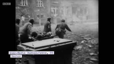 A grenade explodes
in front of the house. - Berlin 1945