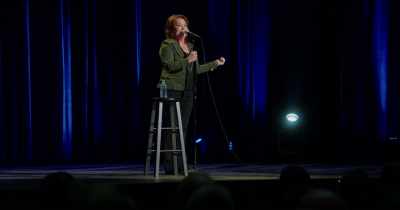 A guy and an older guy with overalls on - Kathleen Madigan: Hunting Bigfoot