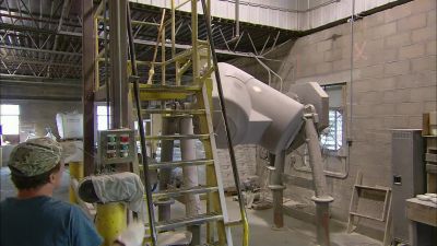 A HOIST THEN LIFTS
THE RAW INGREDIENTS CALLED
BATCH - How It's Made