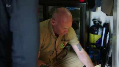 A honey blast reticulated python, - Britain's Tiger Kings - On the Trail with Ross Kemp
