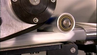 A HOT, IRON-LIKE DEVICE,
CALLED AN EMBOSSING PRESS, - How It's Made