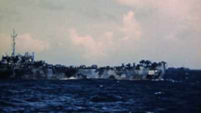 A JAPANESE DEFENDER
WONDERS WHAT'S GOING ON. - The Pacific War in Color