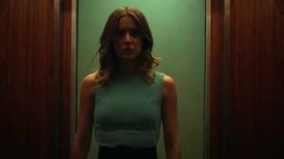 A LARGE, TENSE CROWD
GATHERED - Marvel's Iron Fist