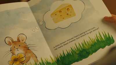 : A little brown mouse
had a pang in his tum. - Ruby and the Well