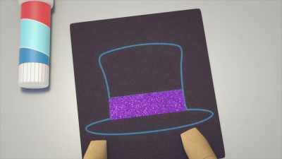 A magic top hat
with a glittery band on it. - Gabby's Dollhouse
