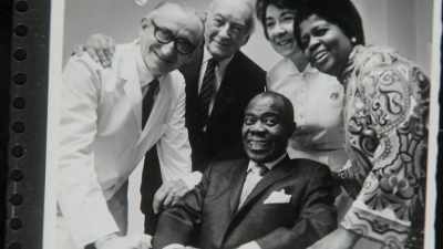 A man going into intensive care twice, - Louis Armstrong's Black & Blues