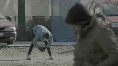 A man with a dog
approaching the object. - The Bridge