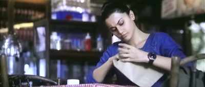 A man's approaching you from your right
with a brown packet to your right. - Naam Shabana