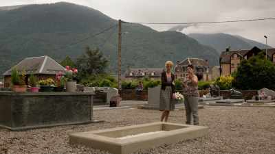 A marble slab
with an engraved headstone. - Being 17