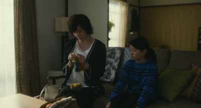 A scarf, a sweater, gloves. - Close-Knit