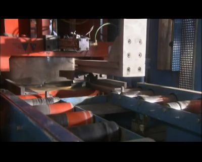 A SECOND PRESS CLAMPS THE DISK - How It's Made