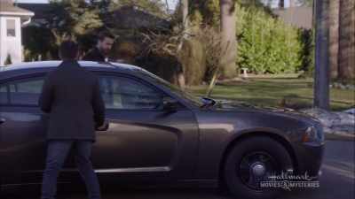 A state trooper
just found Regina's car, - A Bundle of Trouble: An Aurora Teagarden Mystery
