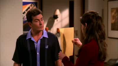 A woman's behind with a butterfly tattoo. - Two and a Half Men
