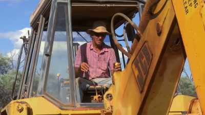 Aaron deepens the trench
one last time. - Outback Opal Hunters