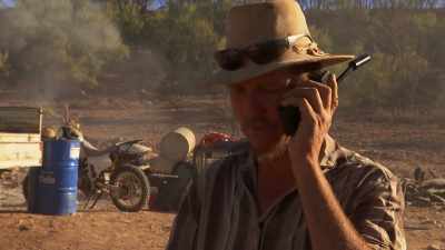 Aaron's setting up a deal
with his opal buyer. - Outback Opal Hunters