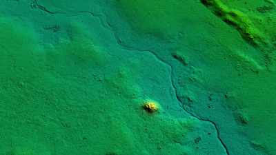 About a mile from the city
center, mysterious structures, - Lost Treasures of the Maya