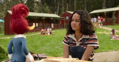 According to the sign,
this place sells teamwork, right? - Woody Woodpecker Goes to Camp