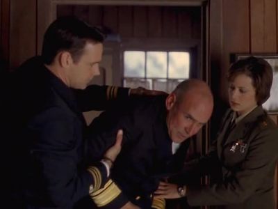 - Admiral. You all right, sir?
- Yeah. How's he? - JAG