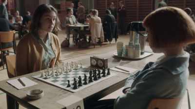 After you move,
you press that button on top, - The Queen's Gambit