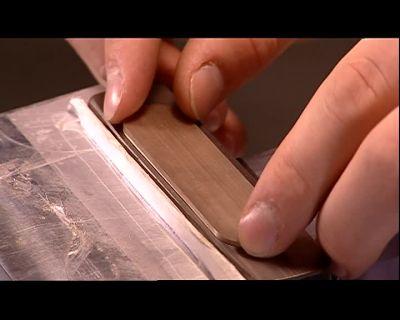 AFTER PLACING THE INSERT
IN THE CAVITY BY HAND, - How It's Made