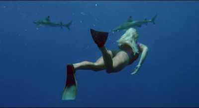 After
surviving a shark attack, - Bethany Hamilton: Unstoppable